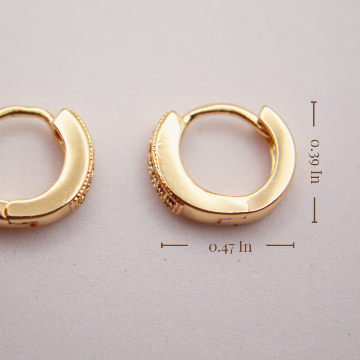 Gold hoop earrings on a light gray background with measurements indicated.
