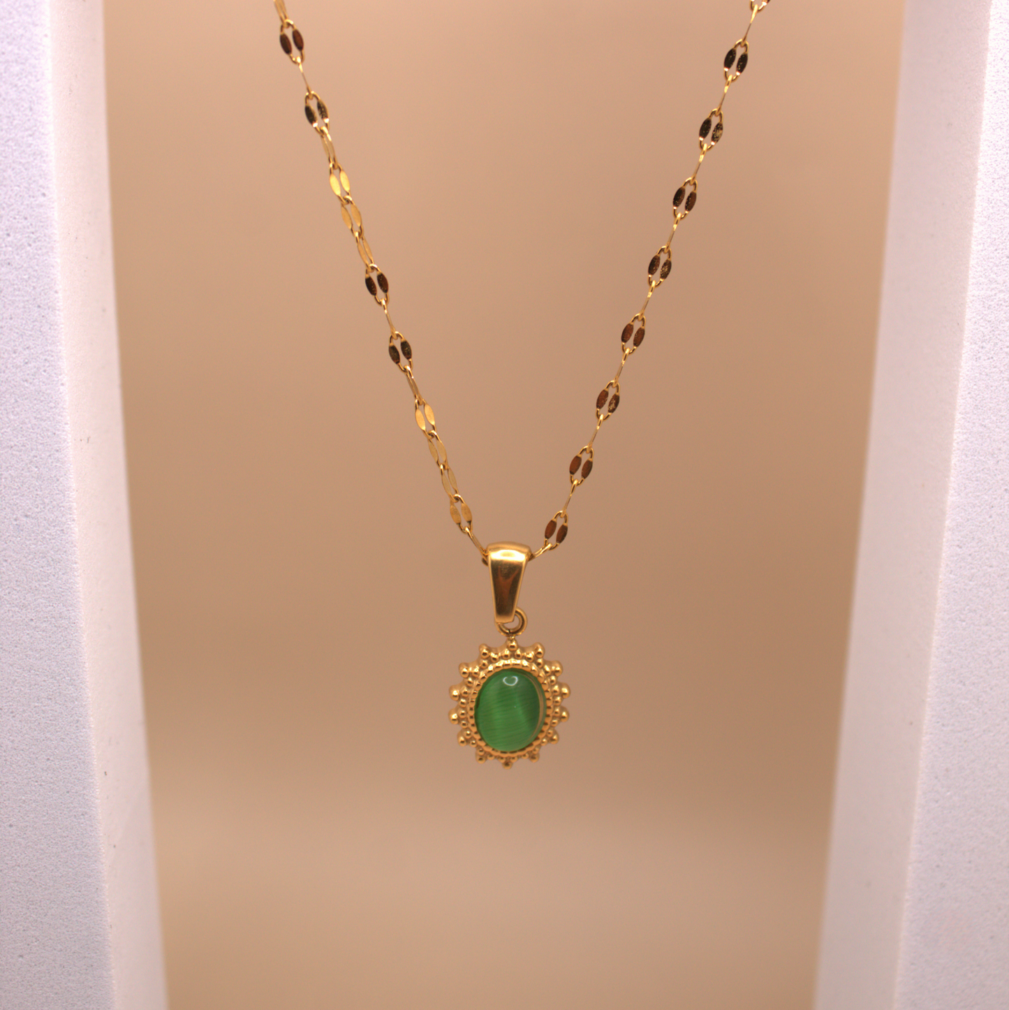 Dainty gold necklace with translucent green stone pendant, PVD stainless steel chain.