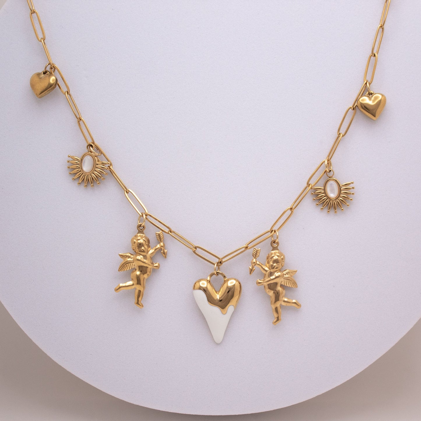 Boho gold heart necklace with cupid and sun charms