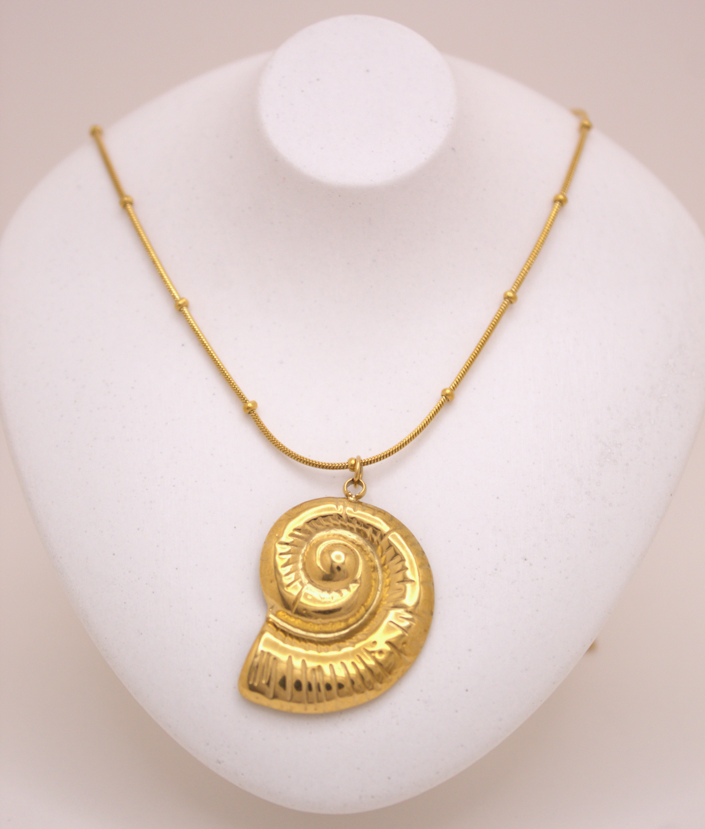 Golden Seashell Necklace with delicate chain and shell pendant