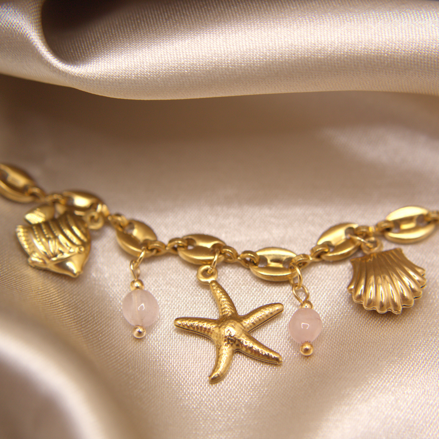 Selva Accessories Pink Tide Bracelet with golden chain and ocean motifs