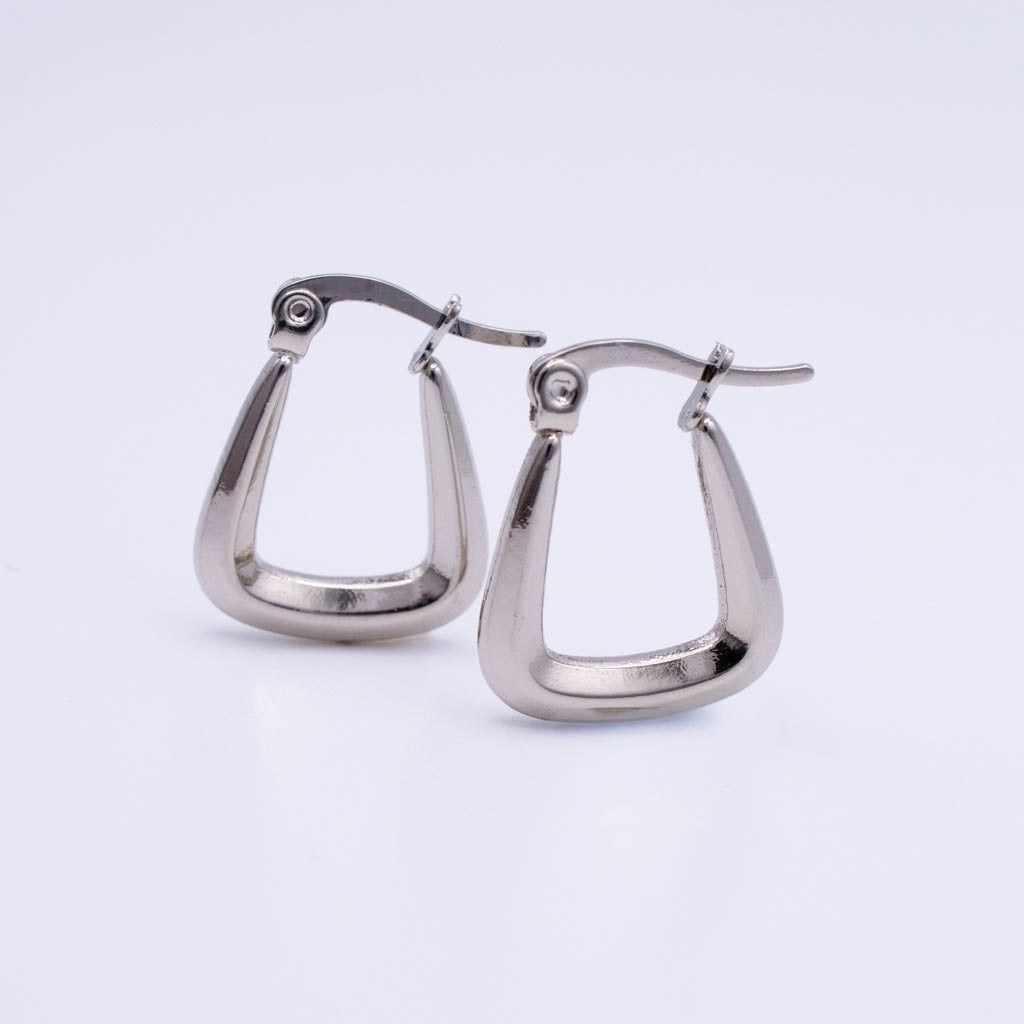A pair of polished silver-tone hoop earrings with a unique curved, open triangular design and lever-back posts, displayed on a clean white background.