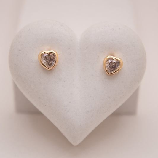 Gold heart stud earrings with high-shine finish by Selva&Co.