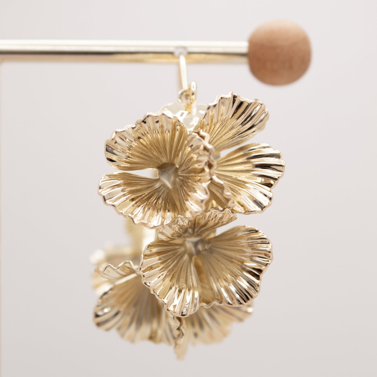 Large gold floral hoop earrings