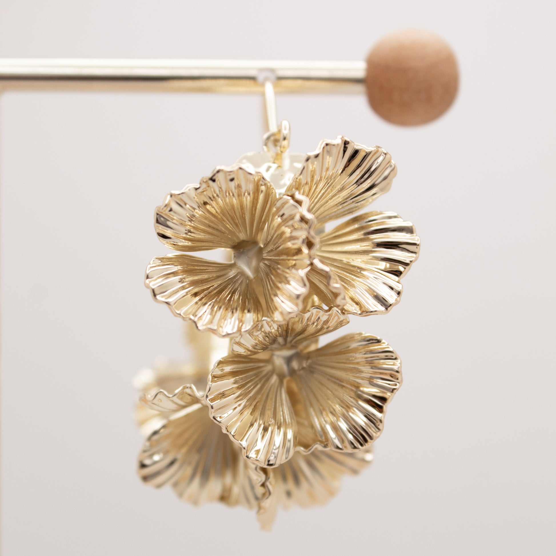Large gold floral hoop earrings