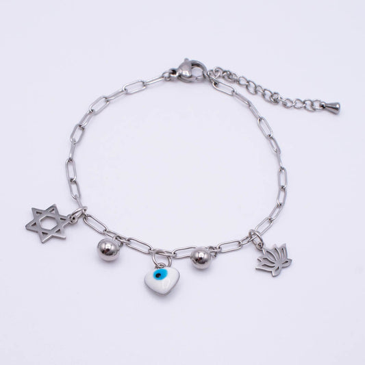 A silver paperclip chain bracelet with four charms:  an evil eye heart, a mezuzah, and a small silver bead, displayed on a clean white background.
