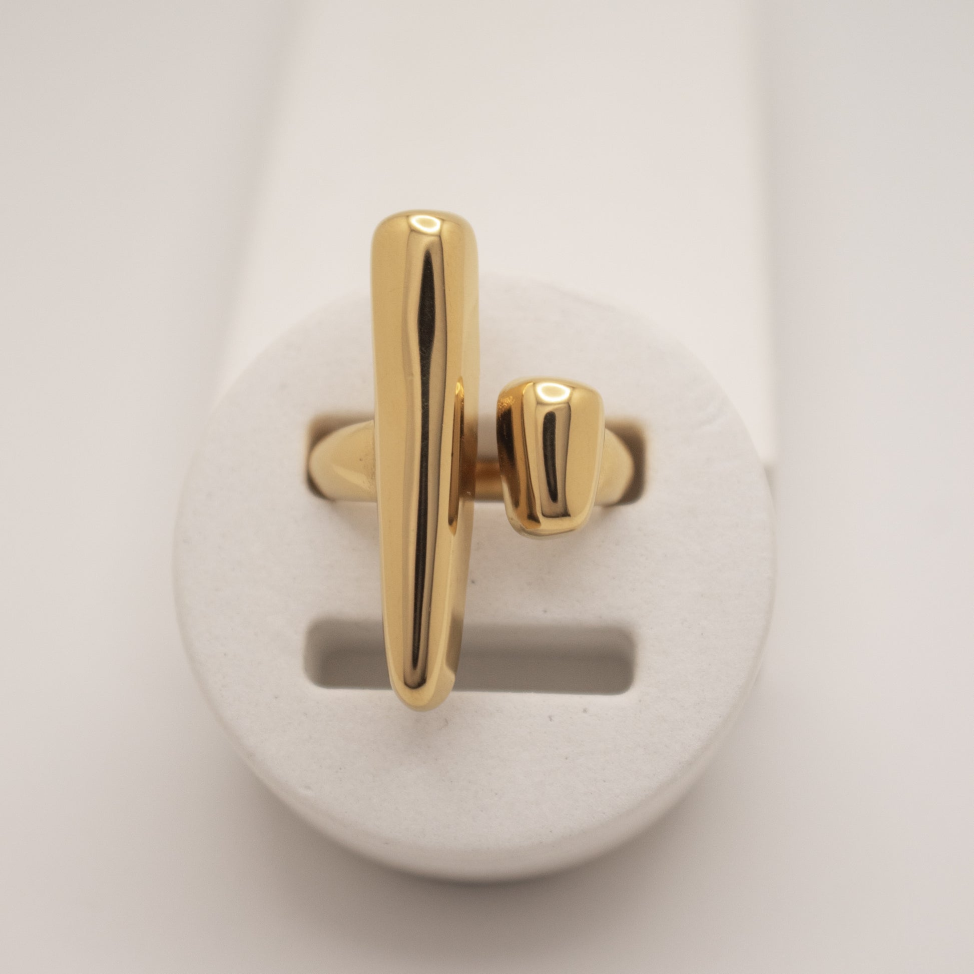 Gold ring on a white background