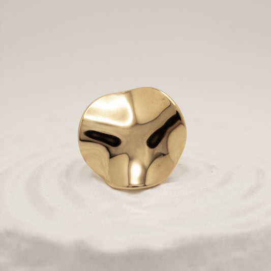 Gold knob on a white background