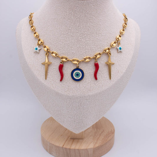 A gold-tone chain necklace displayed on a beige fabric jewelry bust. The necklace features dangling charms including two red italian horn, a blue and white evil eye pendant, two gold-tone starfish, and two small turquoise star charms.