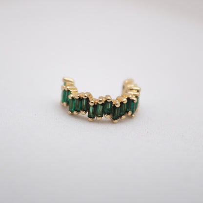 Golden ear cuff with green baguette crystals