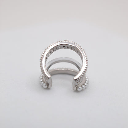 Elegant silver ear cuff with shiny crystals