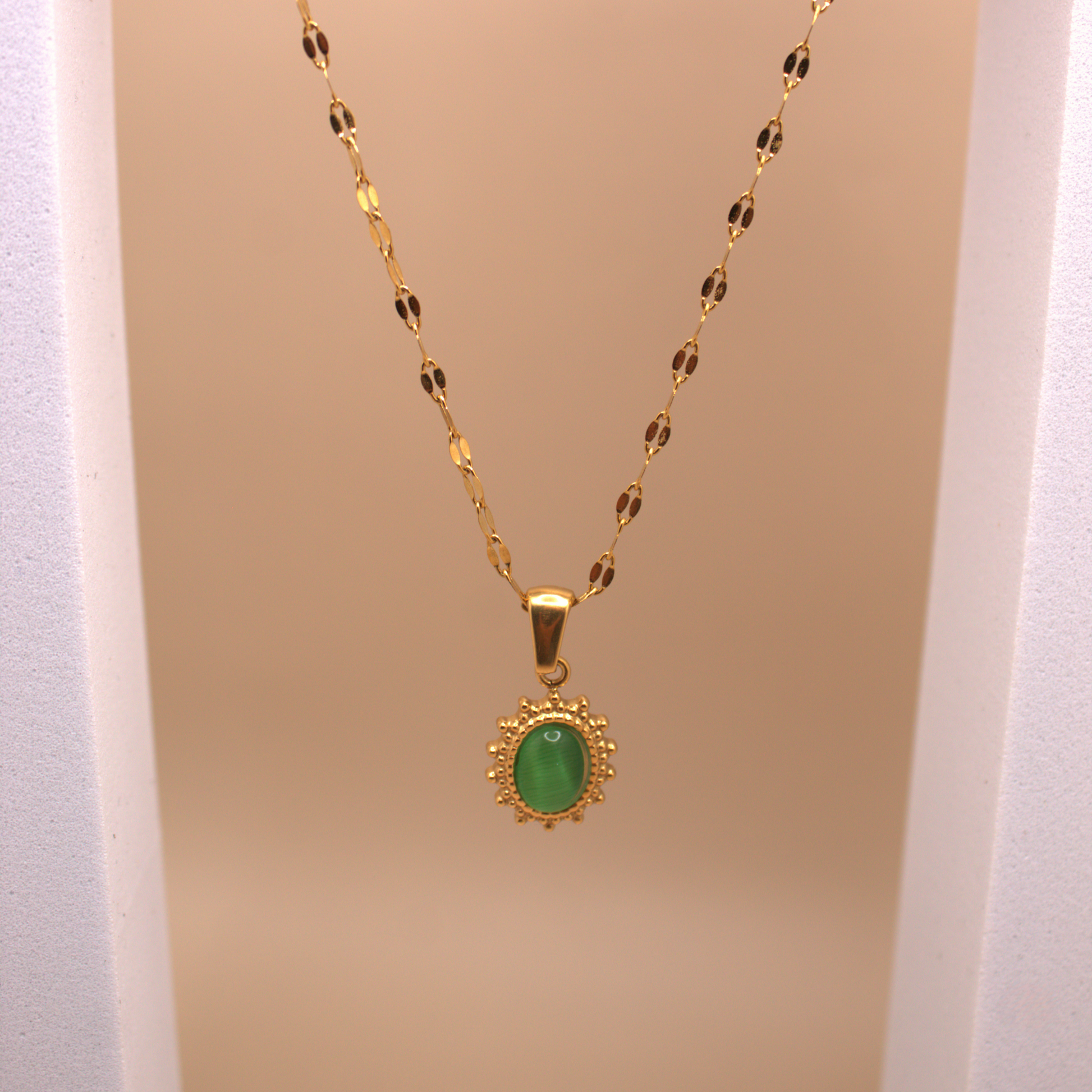 Dainty gold necklace with translucent green stone pendant, PVD stainless steel chain.