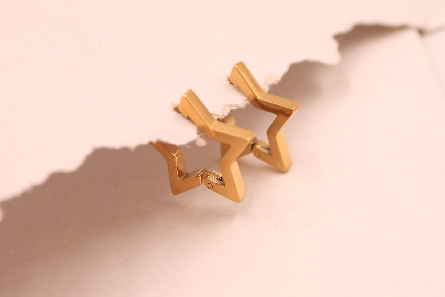 Classic gold star hoop earrings, hypoallergenic stainless steel, elegant everyday wear.