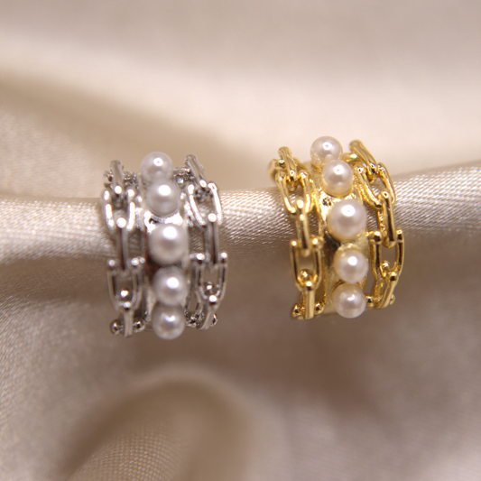 Elegant gold and silver ear cuff with soft pearl accents by Selva&Co.