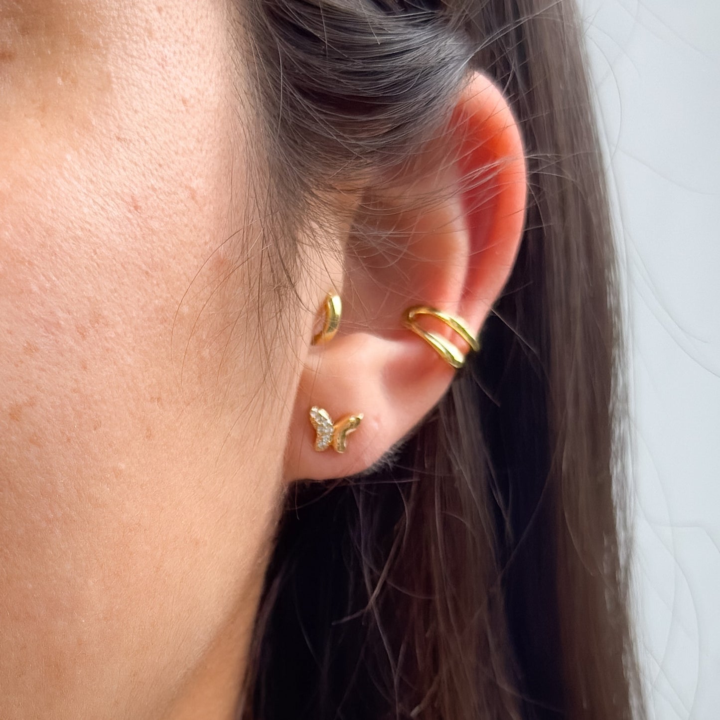 Delicate butterfly studs golden
