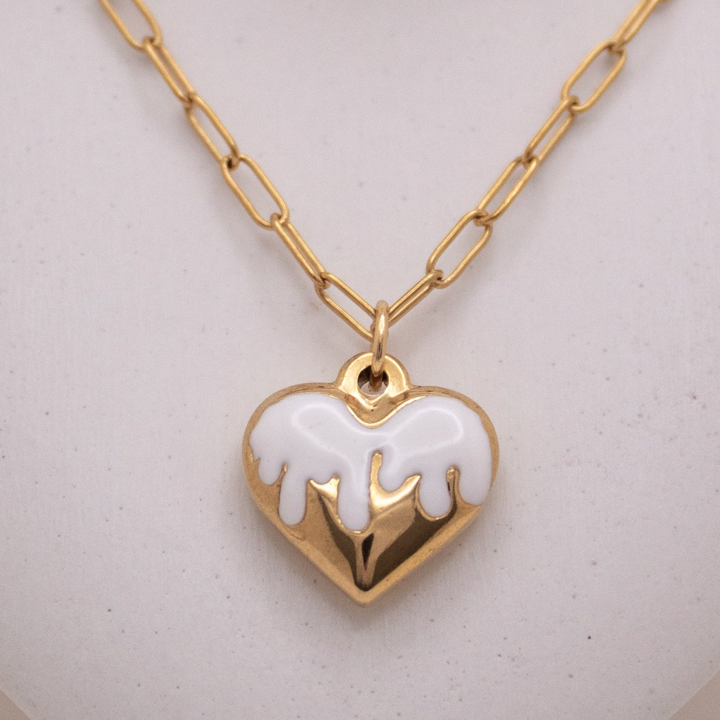 Milky Heart gold necklace with white enamel heart pendant