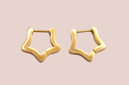 Dainty gold star hoops, stainless steel earrings with modern star design.