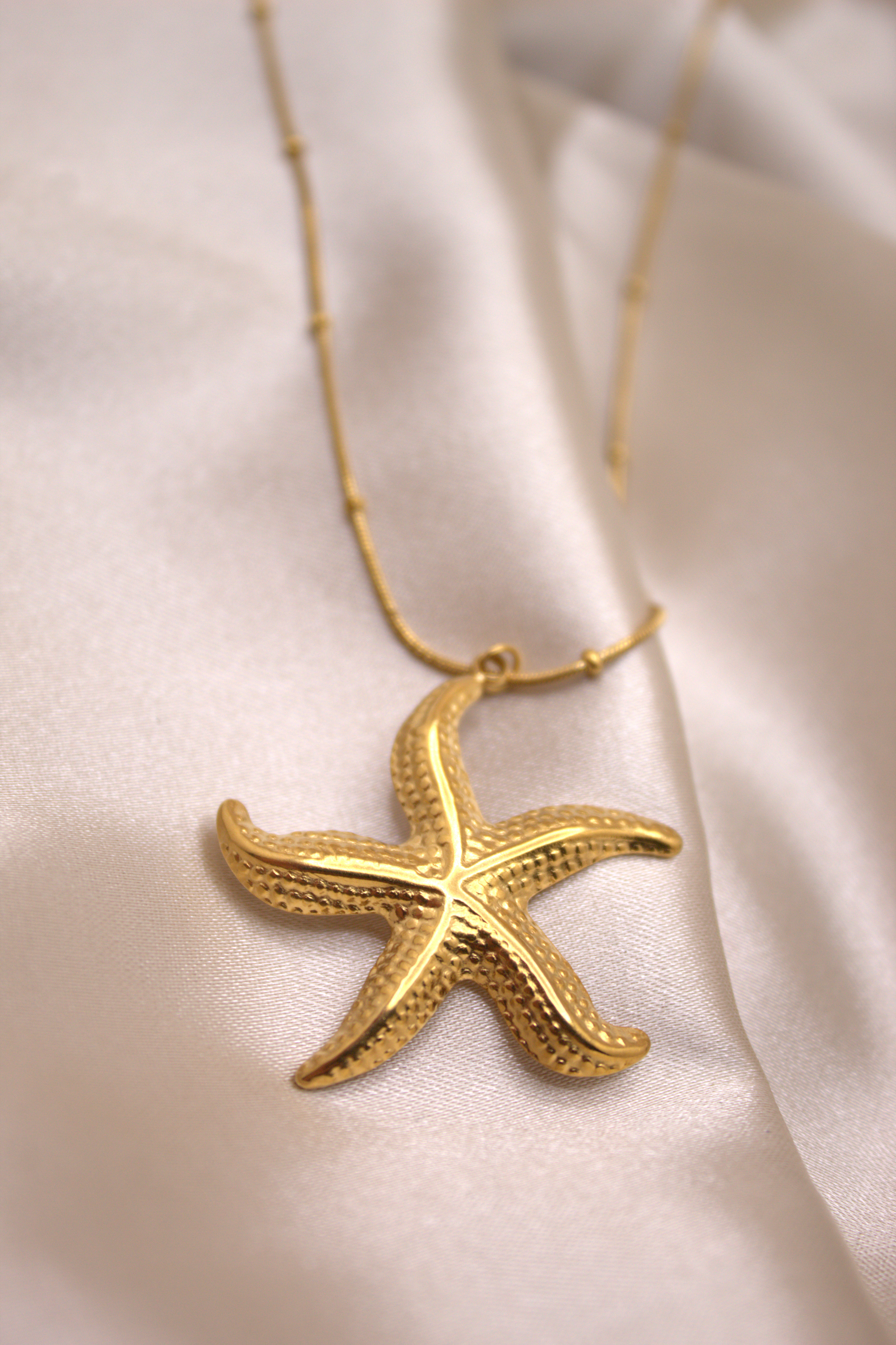 Golden Ocean Star Necklace with micro-bead chain and marine charm