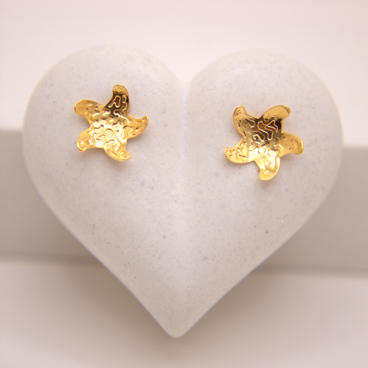 Gold textured starfish stud earrings by Selva&Co.