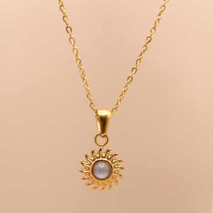 Small gold sun charm necklace, stainless steel waterproof design with delicate chain.