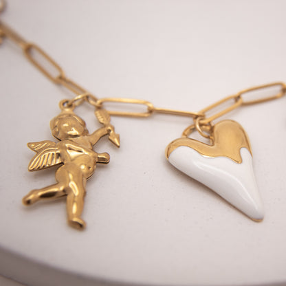 Golden Amour necklace featuring cupid charms and enamel heart