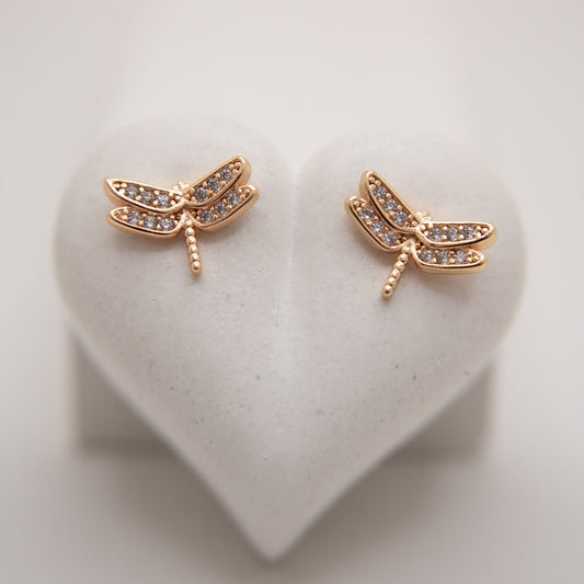 Golden dragonfly stud earrings with white zirconia by Selva