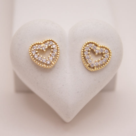 Gold heart stud earrings with crystal inlays in a heart shape