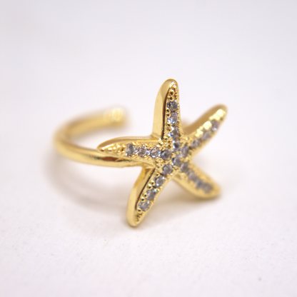 Gold starfish ear cuff with white zirconia accents by Selva&Co.