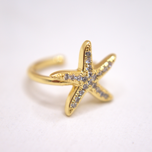 Gold starfish ear cuff with white zirconia accents by Selva&Co.