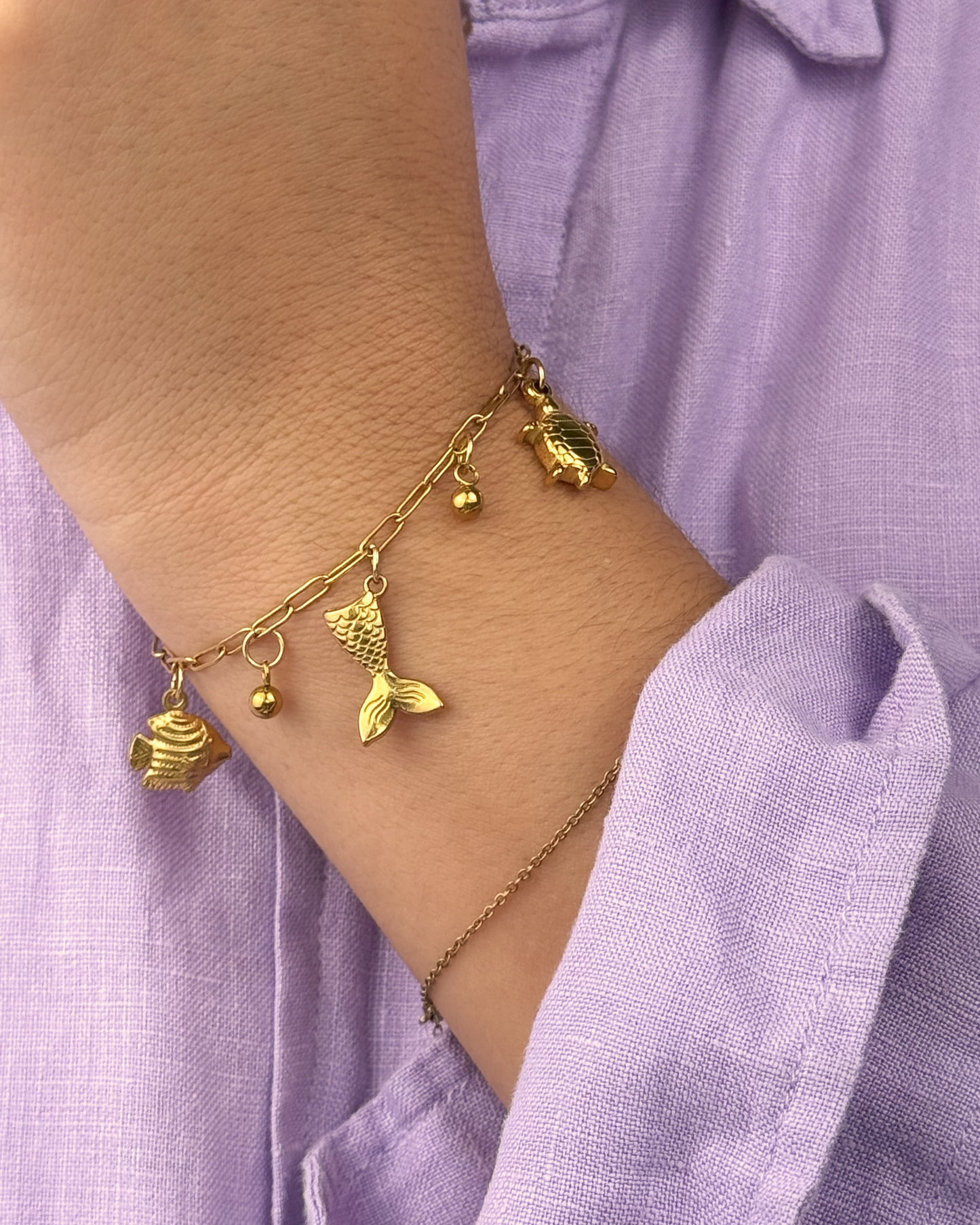 Golden Mermaid Dreams Bracelet featuring marine animal charms by Selva Accessories