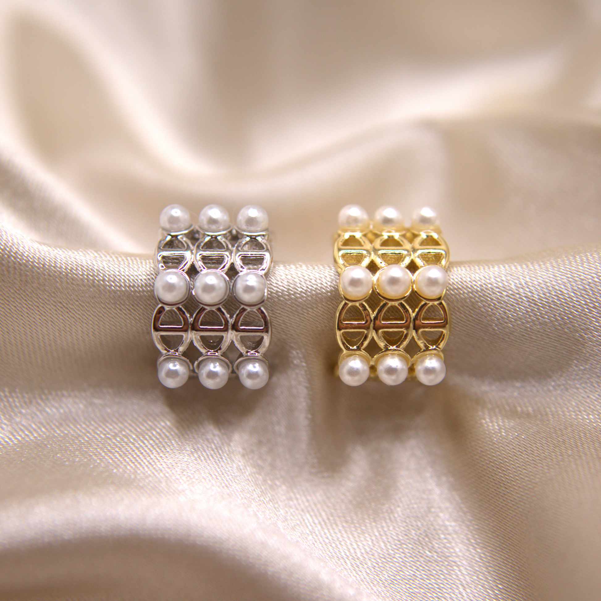 Elegant gold and silver ear cuff with pearl details by Selva&Co.