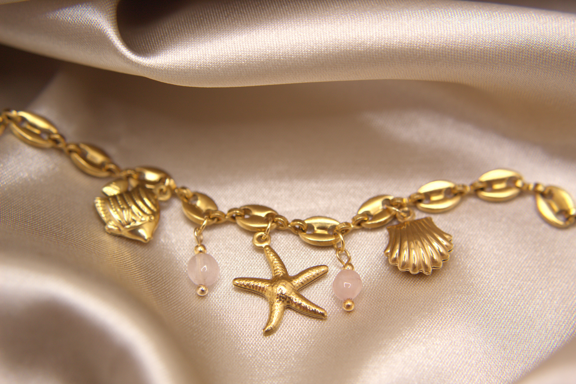 Selva Accessories Pink Tide Bracelet with golden chain and ocean motifs