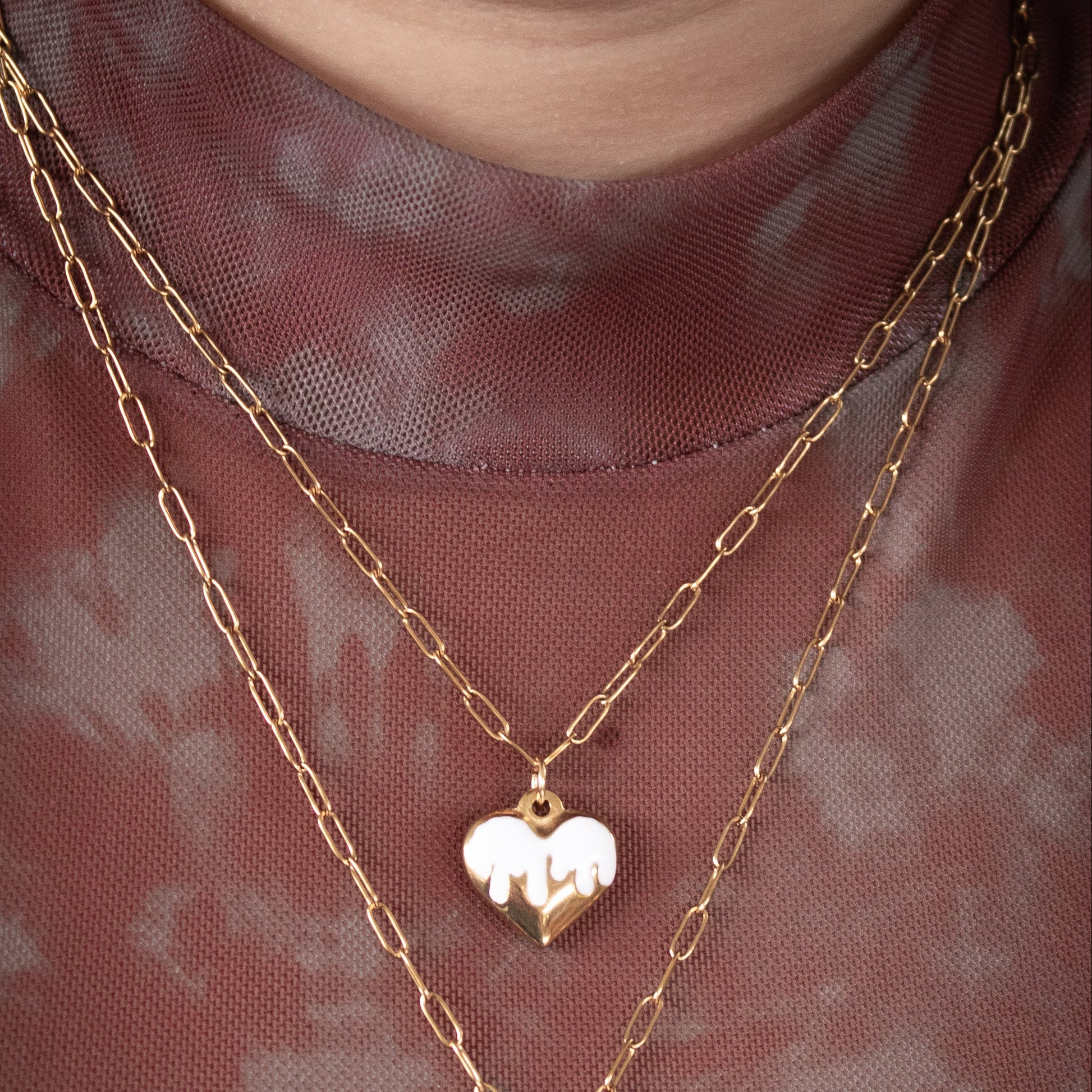 Minimal gold heart necklace with white enamel detail