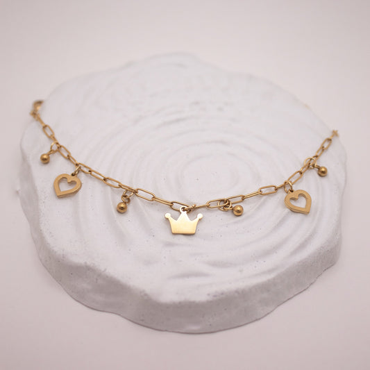 Gold charm bracelet with heart and crown details in PVD stainless steel