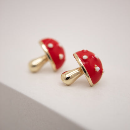 Golden mushroom stud earrings with red and white enamel by Selva