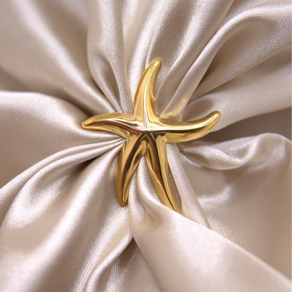 Gold starfish adjustable ring inspired by ocean elegance by Selva&Co.