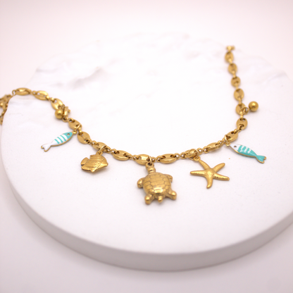 Waterproof gold necklace with starfish, turtle, and ocean animals