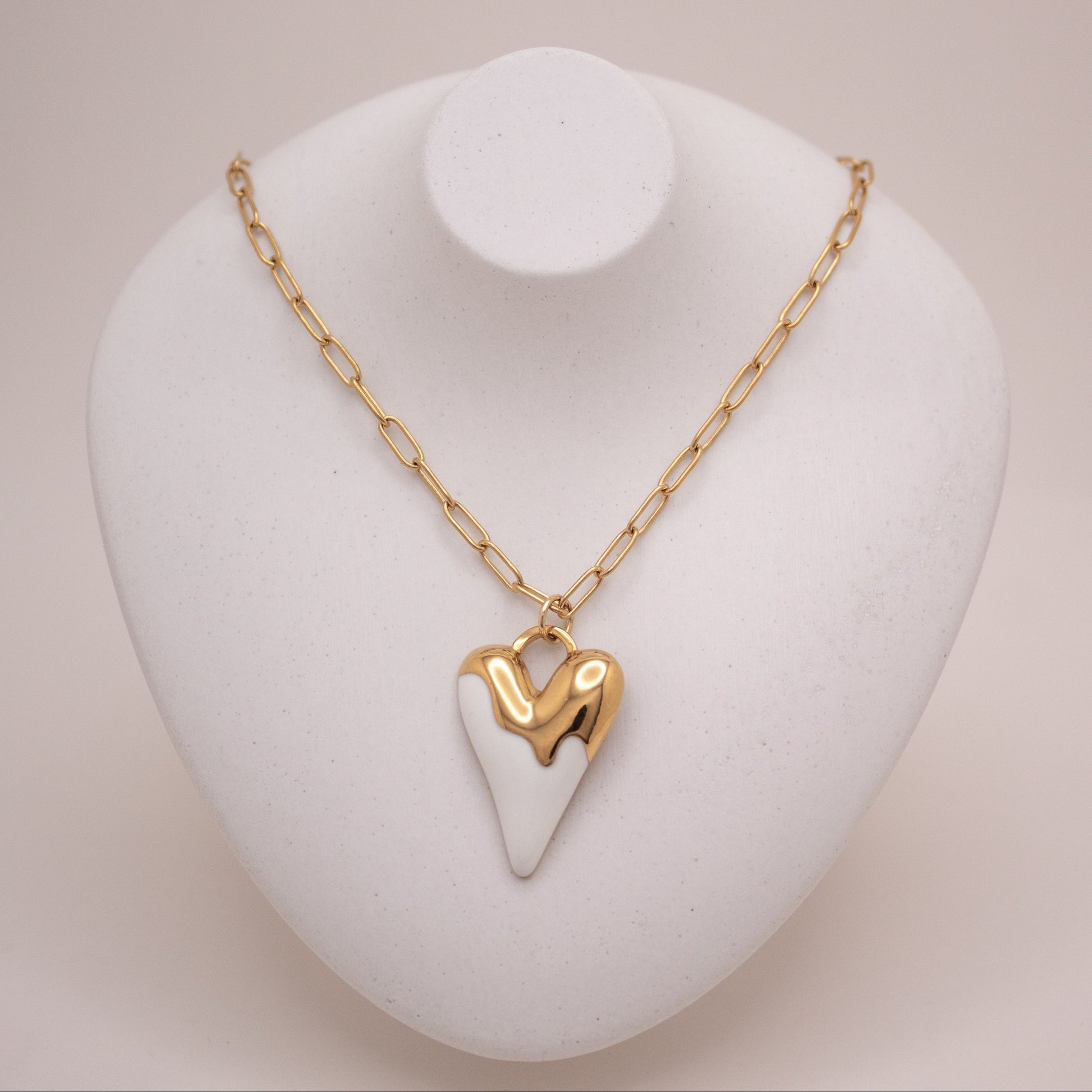 Gold heart necklace with white enamel glaze pendant