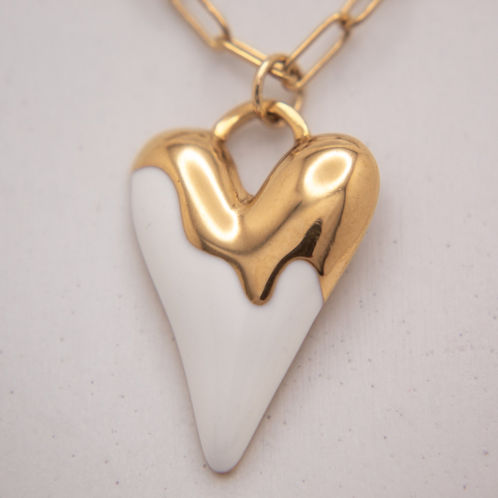 Vanilla Heart gold necklace with white enamel heart charm
